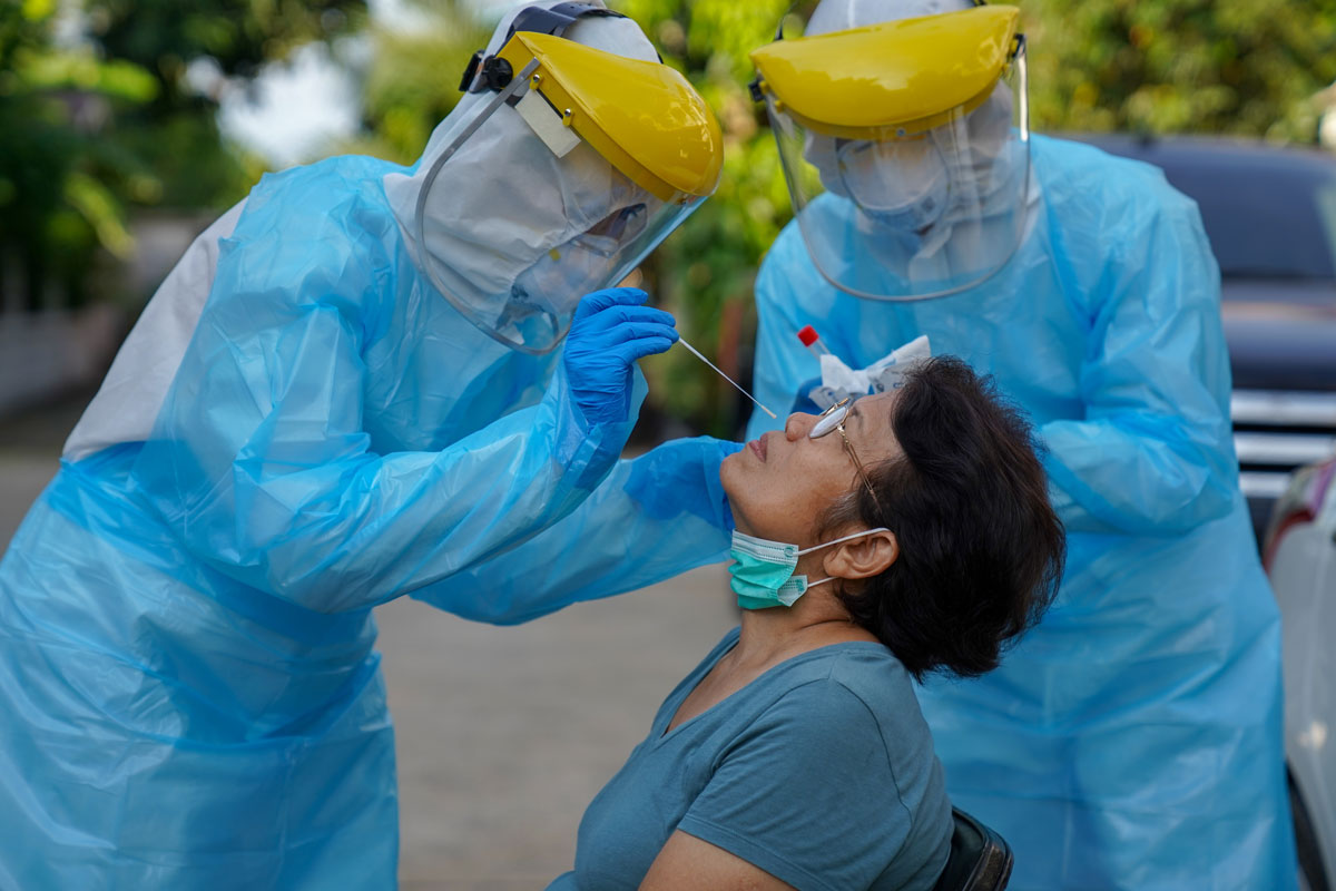 medical workers testing for COVID-19