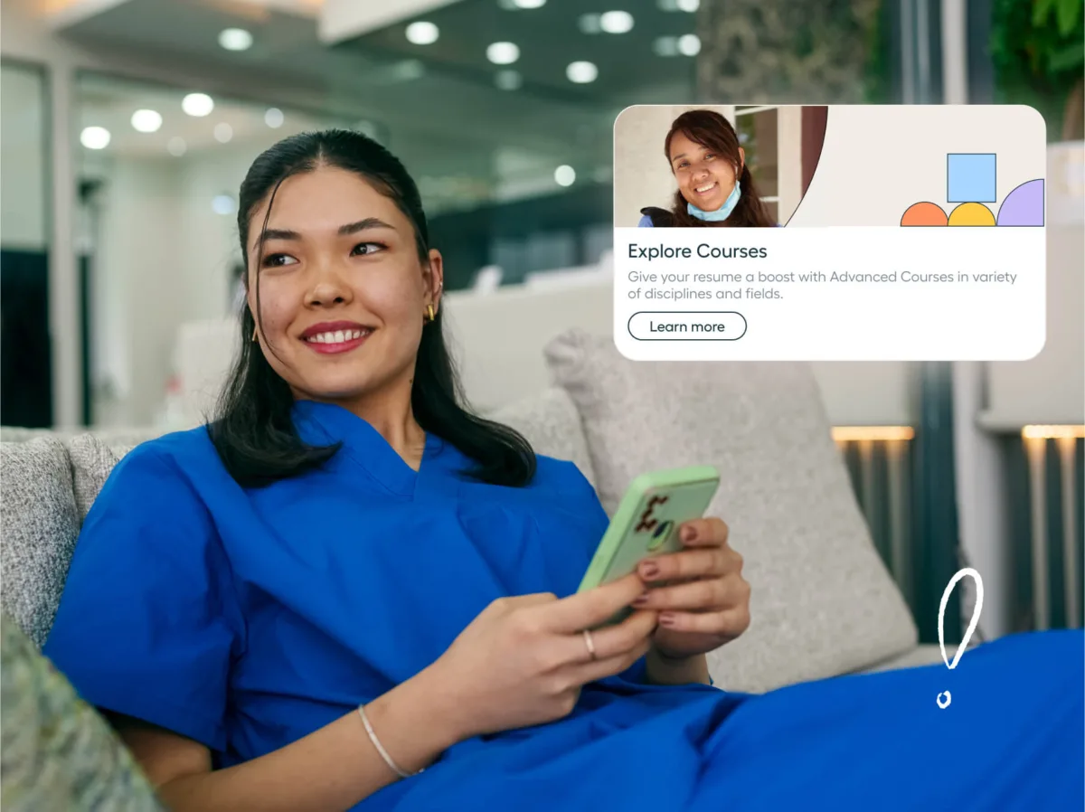 A woman in blue scrubs sits on a couch smiling and holding a phone. An on-screen popup promotes advanced courses with a “Learn more” button.